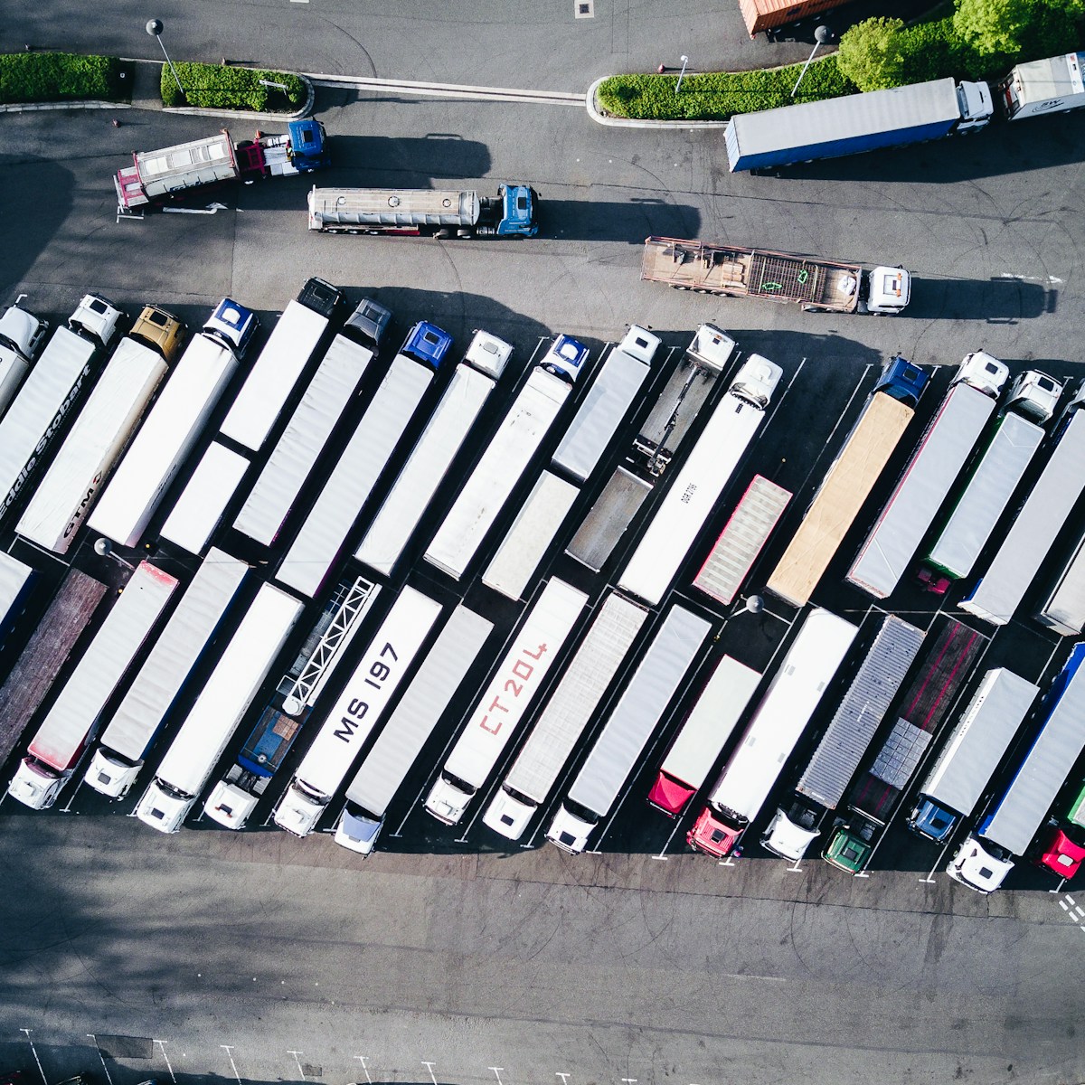 aerial photography of freight truck lot with commercial auto coverage